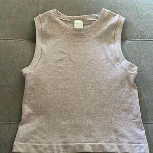 Athleta tank top. In dusty pink color. Size M.